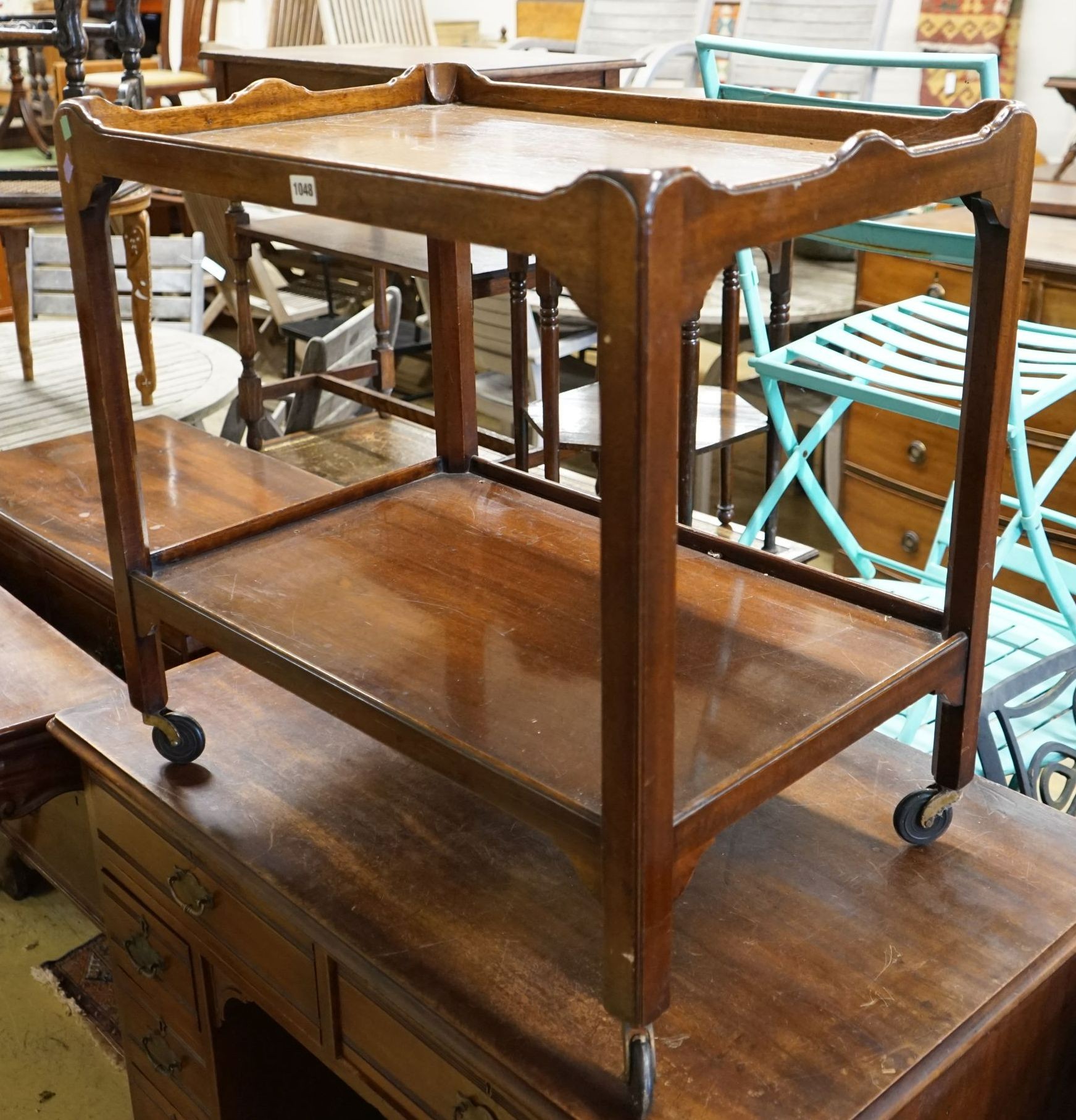 A late Victorian mahogany kneehole desk, length 107cm, height 80cm